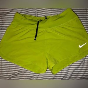 Neon green Nike shorts